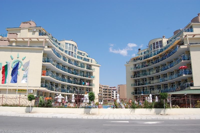 The two buildings of the complex seen from the street