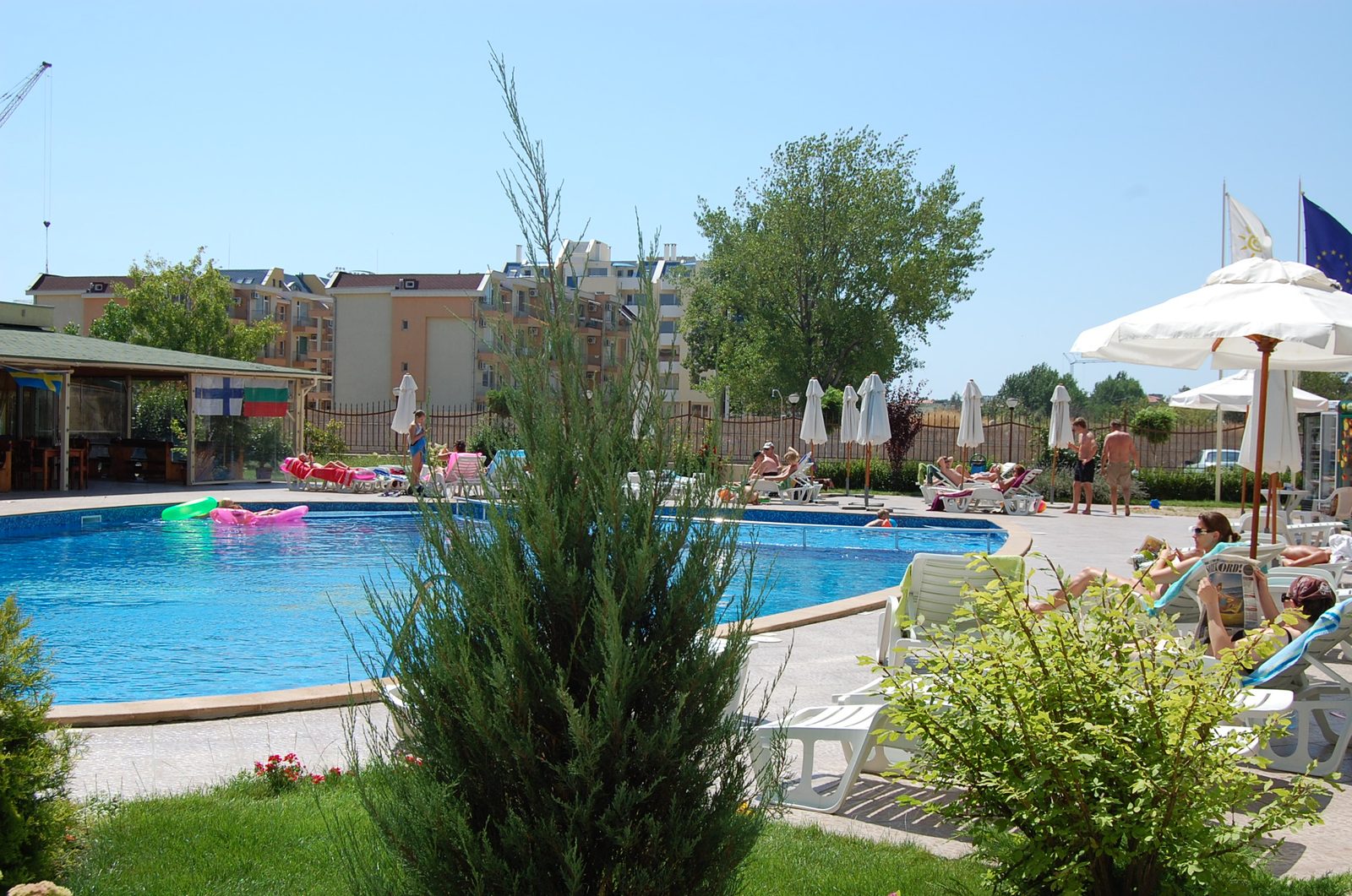 Sun loungers and umbrellas by the pool