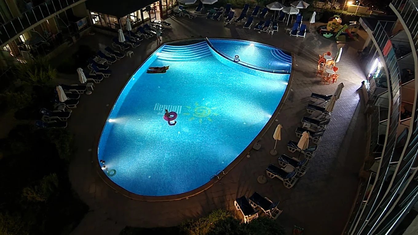 The pool in the evening with underwater lighting